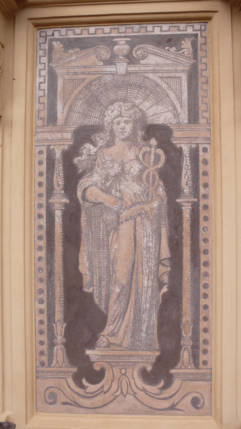 Kvinnemotiv med Merkurstav. Staven omslynget av to slanger, er guden for handel og kommunikasjon sitt symbol. En statue av Merkur står bla foran Oslo børs (ferdigstilt 1829). Foto: T. Berner